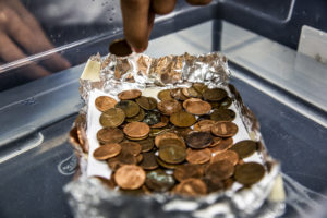Students at Lindblom Math and Science Academy test their boats that aim to hold as many pennies as possible as part of a University of Michigan Alternative Spring Break program by in Chicago, IL on March 1, 2016. The Michigan students are part of a NSBE/SHPE conglomeration that is running a series of STEM-based workshops within various schools in Chicago during their spring break. Photo: Joseph Xu/Michigan Engineering Multimedia Content Producer, University of Michigan